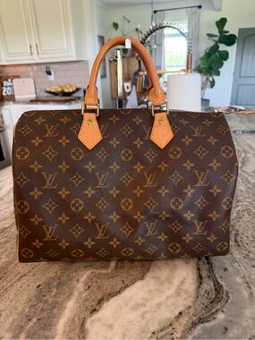 Louis Vuitton Brown Monogram Canvas with Tan Vachetta Leather Trim